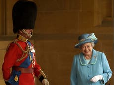 The real story behind the giggling photograph of Prince Philip and the Queen