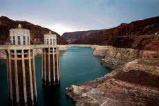 ‘Mega-drought’ on Colorado River system that supplies 40million people causes water level at famous Hoover Dam to drop by 130 feet