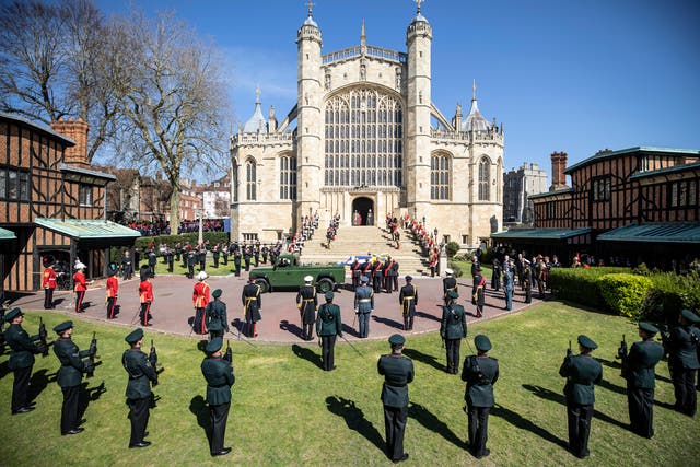Prince Philip, Duke of Edinburgh’s coffin, covered with His Royal Highness’s Personal Standard arrives by Landrover Defender at St George’s Chapel carried by a bearer party found by the Royal Marines during the funeral of Prince Philip, Duke of Edinburgh at Windsor Castle