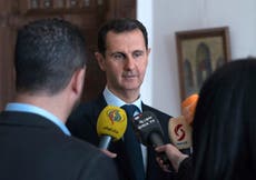 Syria’s Bashar Al-Assad votes in Douma, former rebel town, site of chemical attack