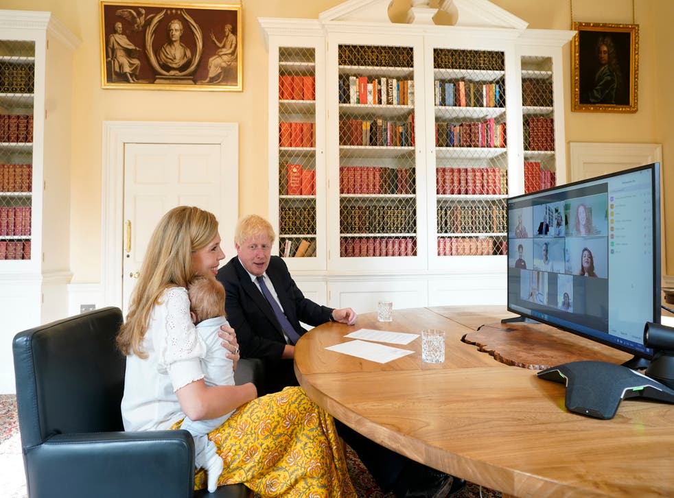 <p>The couple with Wilf in the Downing Street study last year  </p>