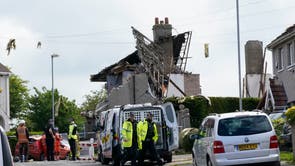 Emergency workers at the scene of a suspected gas explosion, in which a young child was killed and two people were seriously injured, on Mallowdale Ave Heysham which caused 2 houses to collapse and badly damaged another