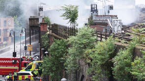 Emergency services attend a fire nearby the Elephant & Castle Rail Station in London