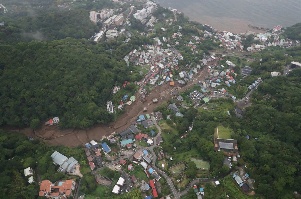 Rescuers in Japan hunt for 80 missing following deadly landslides