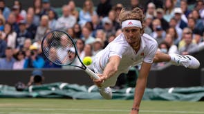 Alexander Zverev playing against Felix Auger-Aliassime in the fourth round of the Gentlemen's Singles on Court 1 on day seven of Wimbledon at The All England Lawn Tennis and Croquet Club