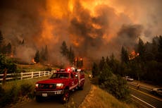 California fire prompts evacuations as Bootleg blaze balloons in Oregon