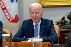 Biden stumps for McAuliffe in early test of political clout