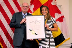 Maryland gov honors swimmer who withdrew from Paralympics