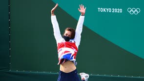 Great Britain’s Mallory Franklin celebrates on the podium after she won silver in the women’s C1 Canoe Slalom at Tokyo Olympics