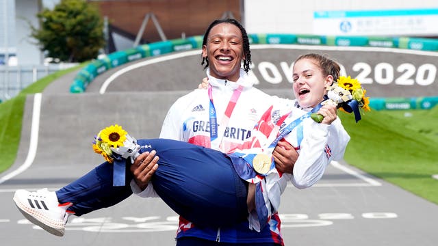 Great Britain's Bethany Shriever and Kye Whyte celebrate their Gold and Silver medals respectively for the Cycling BMX Racing at the Ariake Urban Sports Park on the seventh day of the Tokyo 2020 日本奥运会