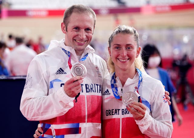 Great Britain's Laura Kenny and Jason Kenny with their silver medals for the Women's Team Pursuit and Men’s Team Sprint during the Track Cycling at the Izu Velodrome on the eleventh day of the Tokyo 2020 Olympic Games in Japan