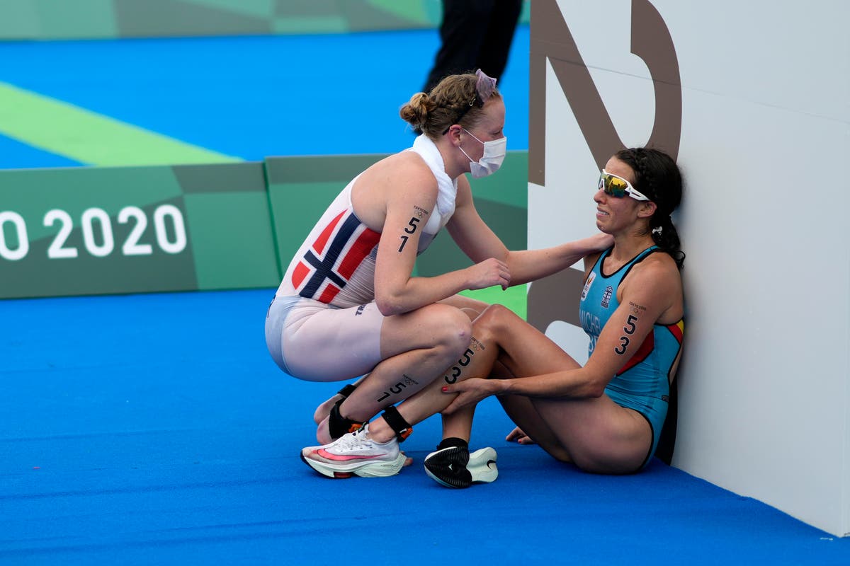 AP-bilder: Kindness, empathy highlight humanity of Olympics