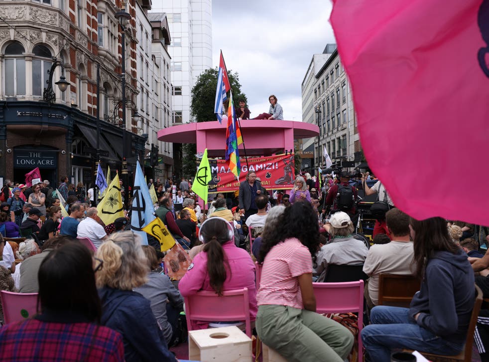 <p>The crisis-talks table, which is still in position, created by XR to signify protestors coming together to join the conversation</p>