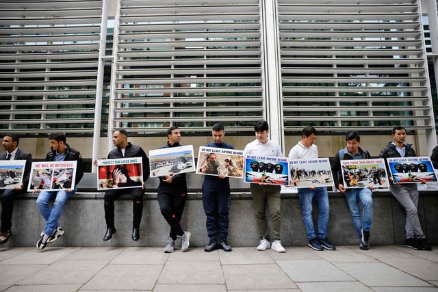 Former interpreters for the British forces in Afghanistan demonstrate outside the Home Office in central London