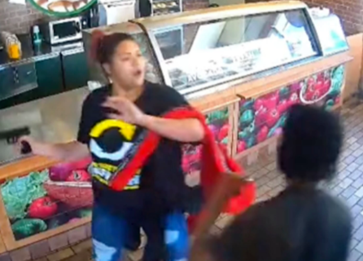 Subway worker says she has been suspended after video showed her beating armed robber