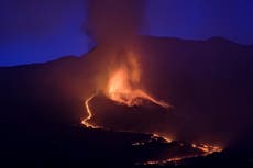 Airport on La Palma reopens as volcanic eruption continues