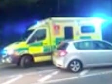 Ambulance crashes into car waiting for fuel in large petrol station queue
