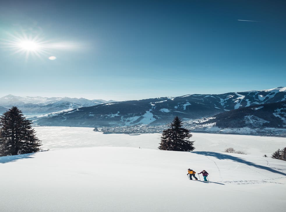 <p>Try snowshoeing with a view of Lake Zell</s>