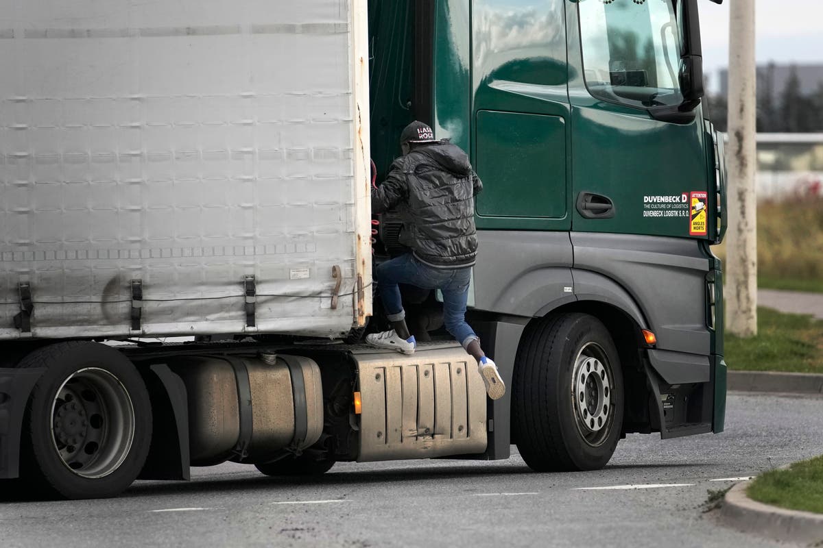 Jumping onto trucks to get to Britain: A migrant's day