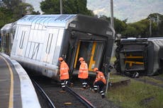 Australian passenger train derails in Sydney after hitting van on crossing