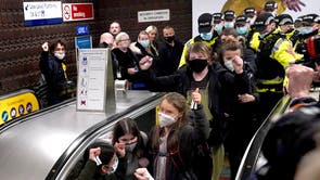 Greta Thunberg arrives at Glasgow Central station on the eve of the conference