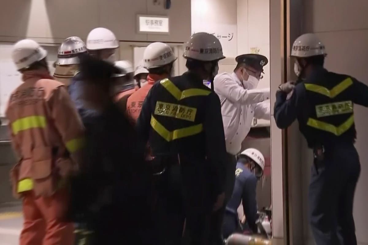 Man with knife injures 17 people on Tokyo train, starts fire