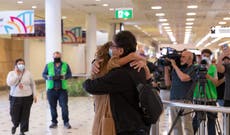 Emotional reunions in Australia as borders reopen to residents