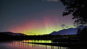   A spectacular display of the Northern Lights seen over Derwentwater, near Keswick in the Lake District