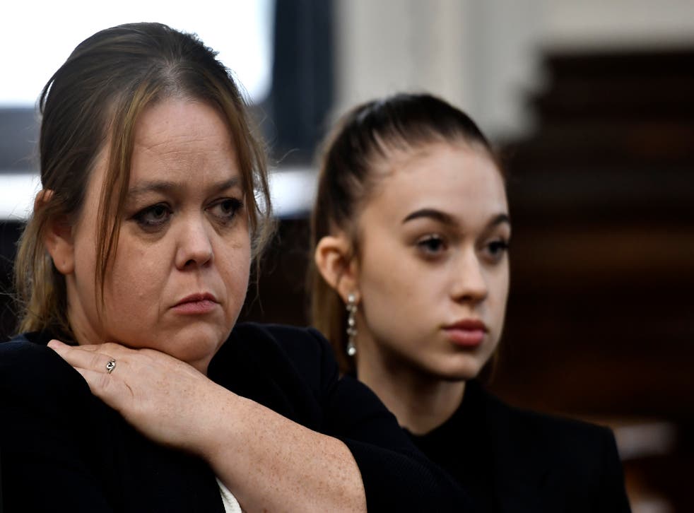 <p> Kyle Rittenhouse’s mother, Wendy, left, and his sister McKenzie, listen during Rittenhouse’s trial at the Kenosha County Courthouse on 3 November 2021 in Kenosha, Wisconsin</p>