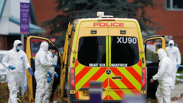 Forensic officers work outside Liverpool Women's Hospital, following a car blast, in Liverpool