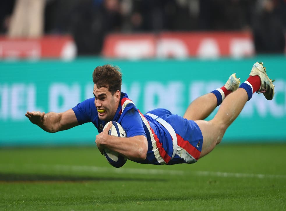 <p>Damian Penaud of France goes over to score</磷>