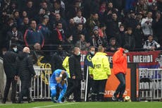 Lyon-Marseille clash halted after Dimitri Payet hit by bottle thrown from crowd