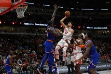 Late rally leads Chicago Bulls to victory over New York Knicks and top of East