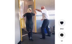 Southwest flight attendants dance for passengers at airport gate
