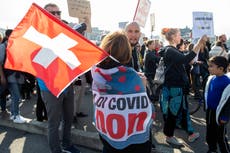 Cases soar but Swiss eschew lockdown as COVID law vote looms