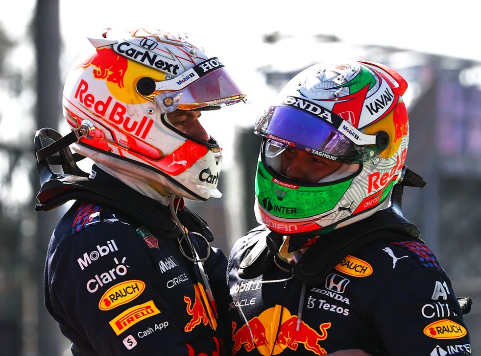 <p>Max Verstappen (left) with Red Bull teammate Sergio Perez</p>