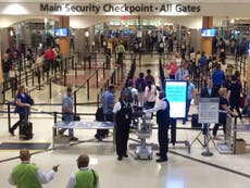 Man accused of firing gun at Atlanta airport turns self in