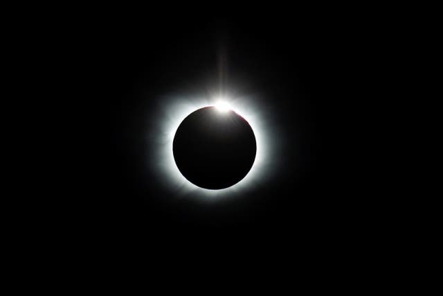 A handout photo made available by Imagen de Chile shows the total solar eclipse seen from the Union Glaciar Joint Scientific Polar Station, in the Chilean Antarctic territory
