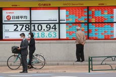 Asian shares mixed after China Evergrande warns of cash woes