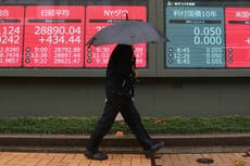 Asian shares mostly higher as virus fears ease 