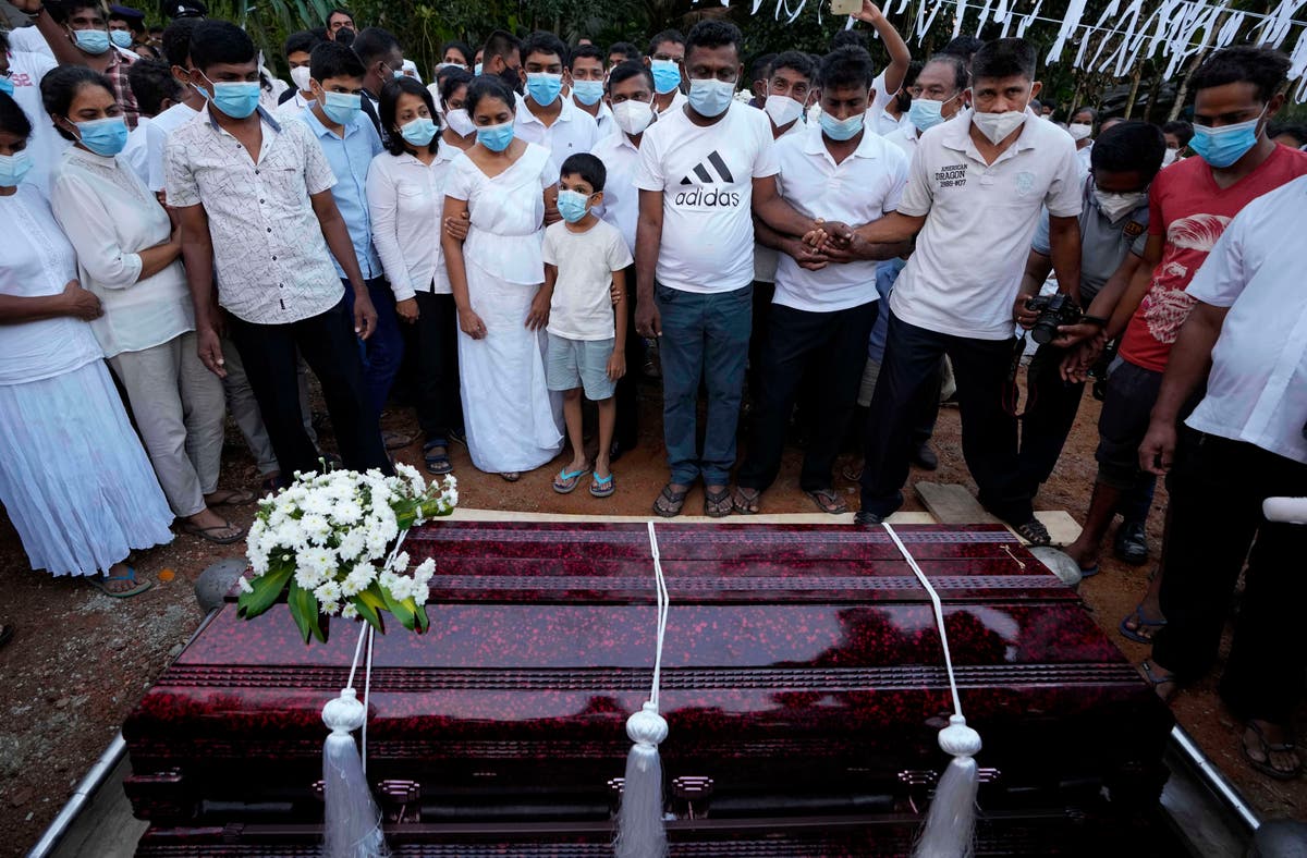 Man lynched in Pakistan buried in native Sri Lanka