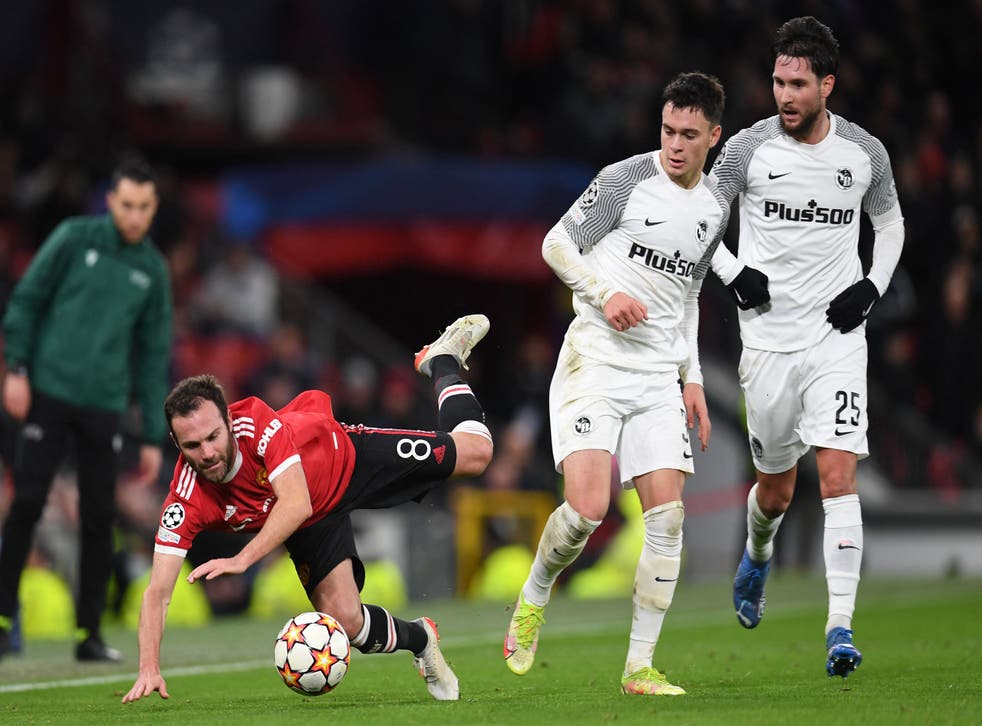 <p>Juan Mata gets stuck in during the first half</s>