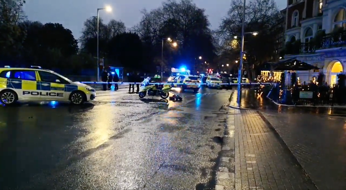 Man shot dead after armed police stop vehicle in Kensington