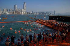 Swimmers race across Hong Kong's Victoria Bay