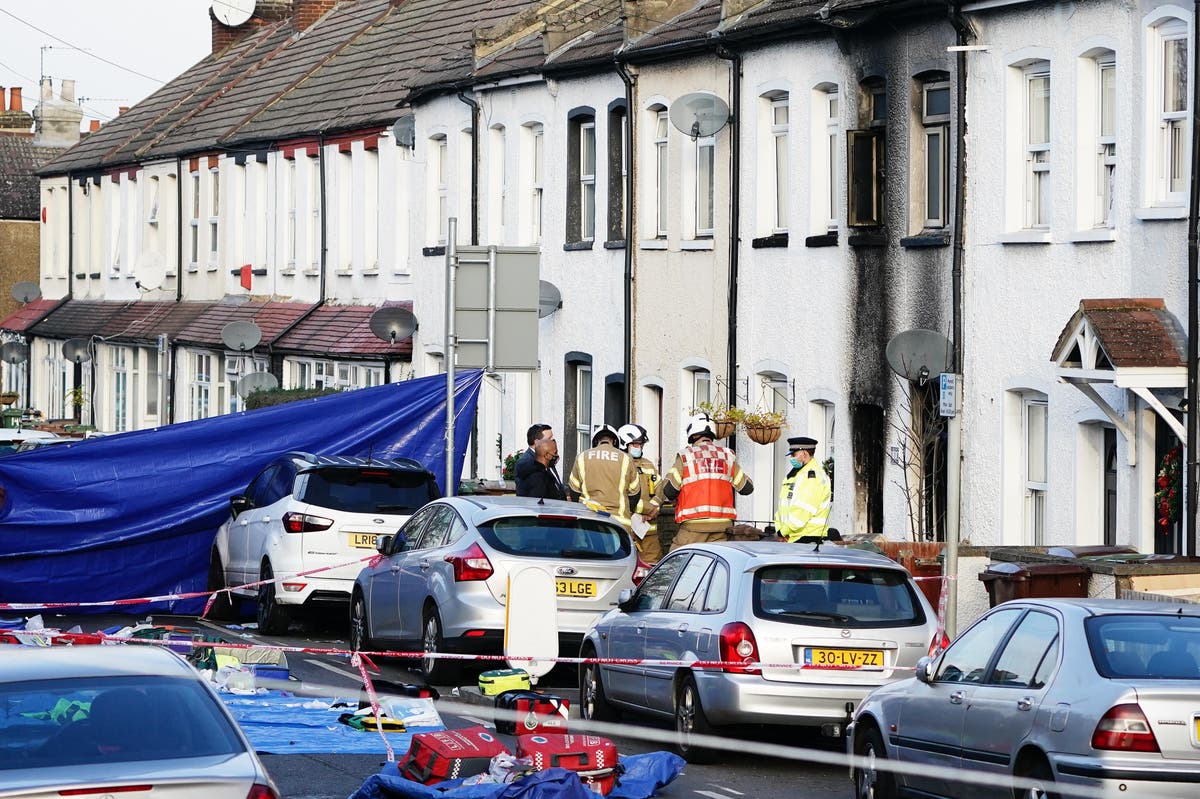 Woman arrested after two sets of twin boys die in Sutton house fire