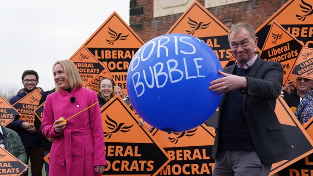 Newly elected Liberal Democrat MP Helen Morgan, bursts 'Boris' bubble' held by colleague  Tim Farron, as she celebrates following her victory in the North Shropshire by-election