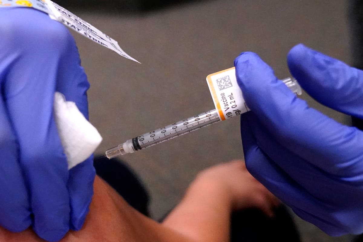 Pfizer adds third dose to vaccine trial for young kids