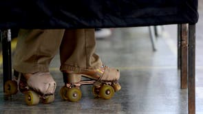 A voter wears rollerskates inside a polling booth in Santiago, Chili