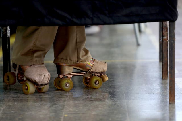 A voter wears rollerskates inside a polling booth in Santiago, Chile
