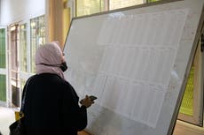 Days before Libya vote, election chief tells poll workers to stand down